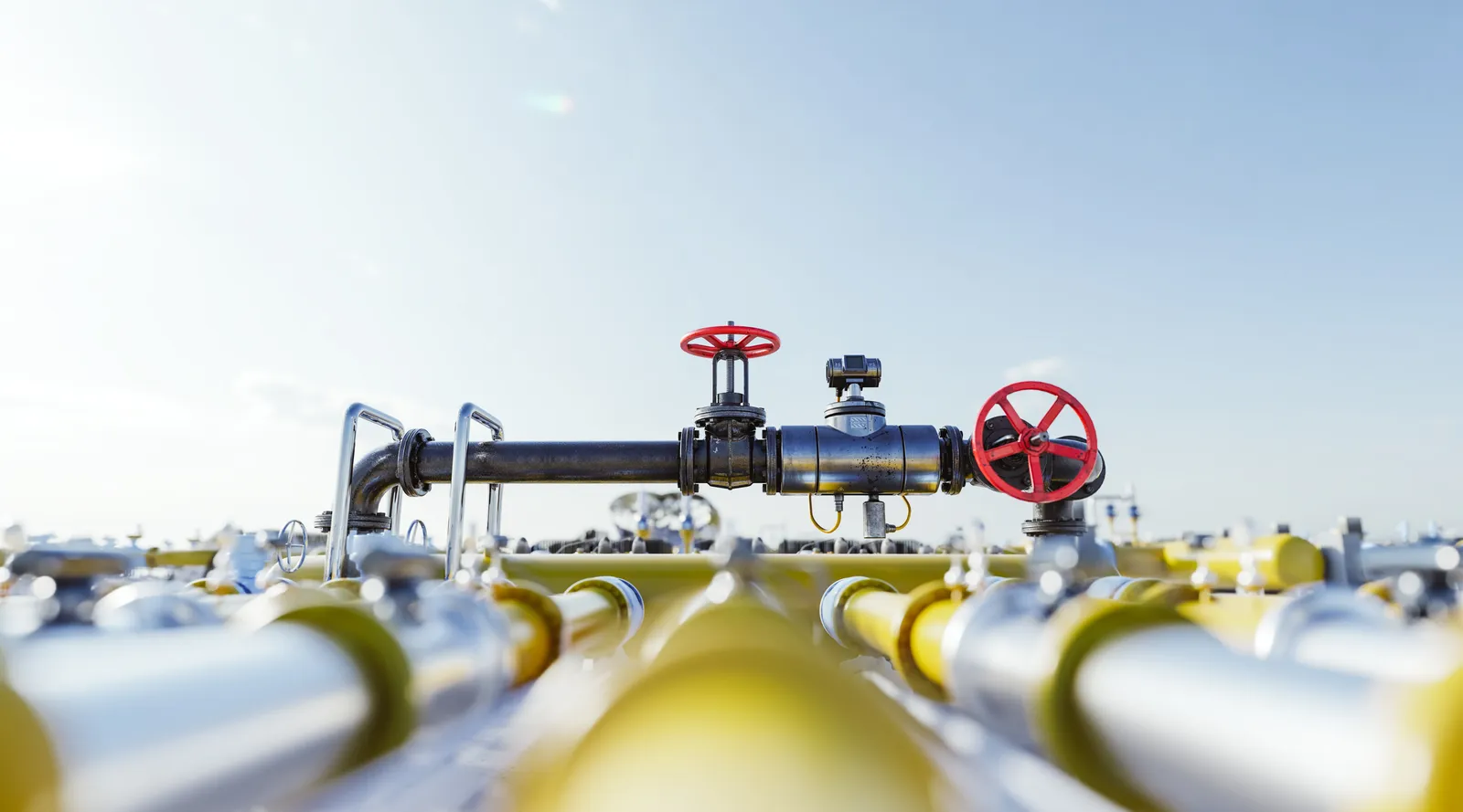 Gas pipework with red valve wheels